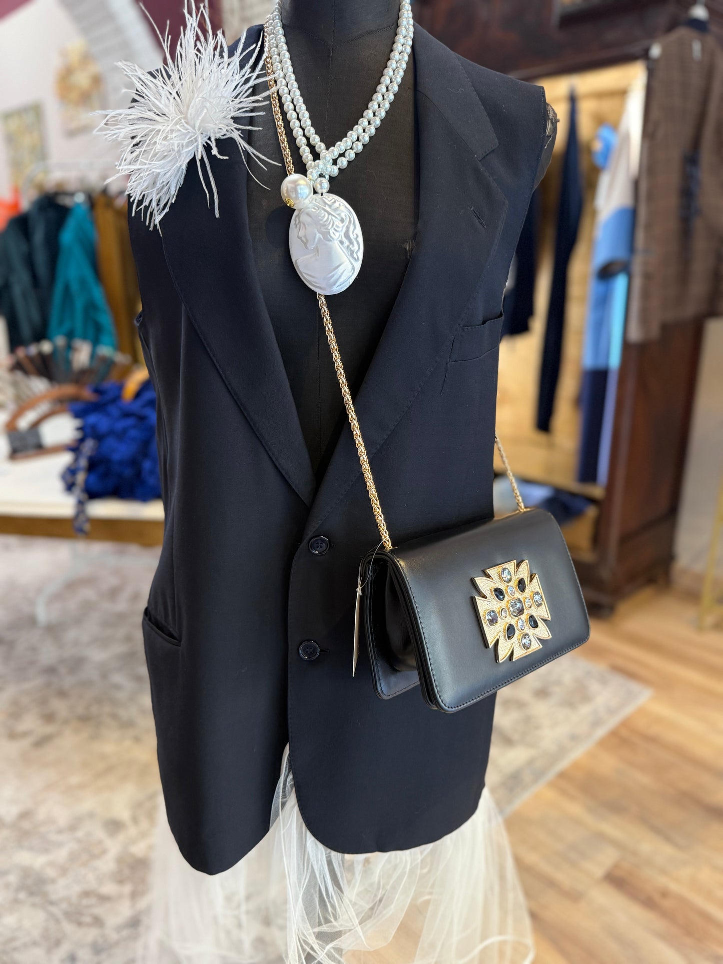 Design e artigianato: Borse artigianali in vera pelle pieno fiore con inserti in cristalli Swarovski.