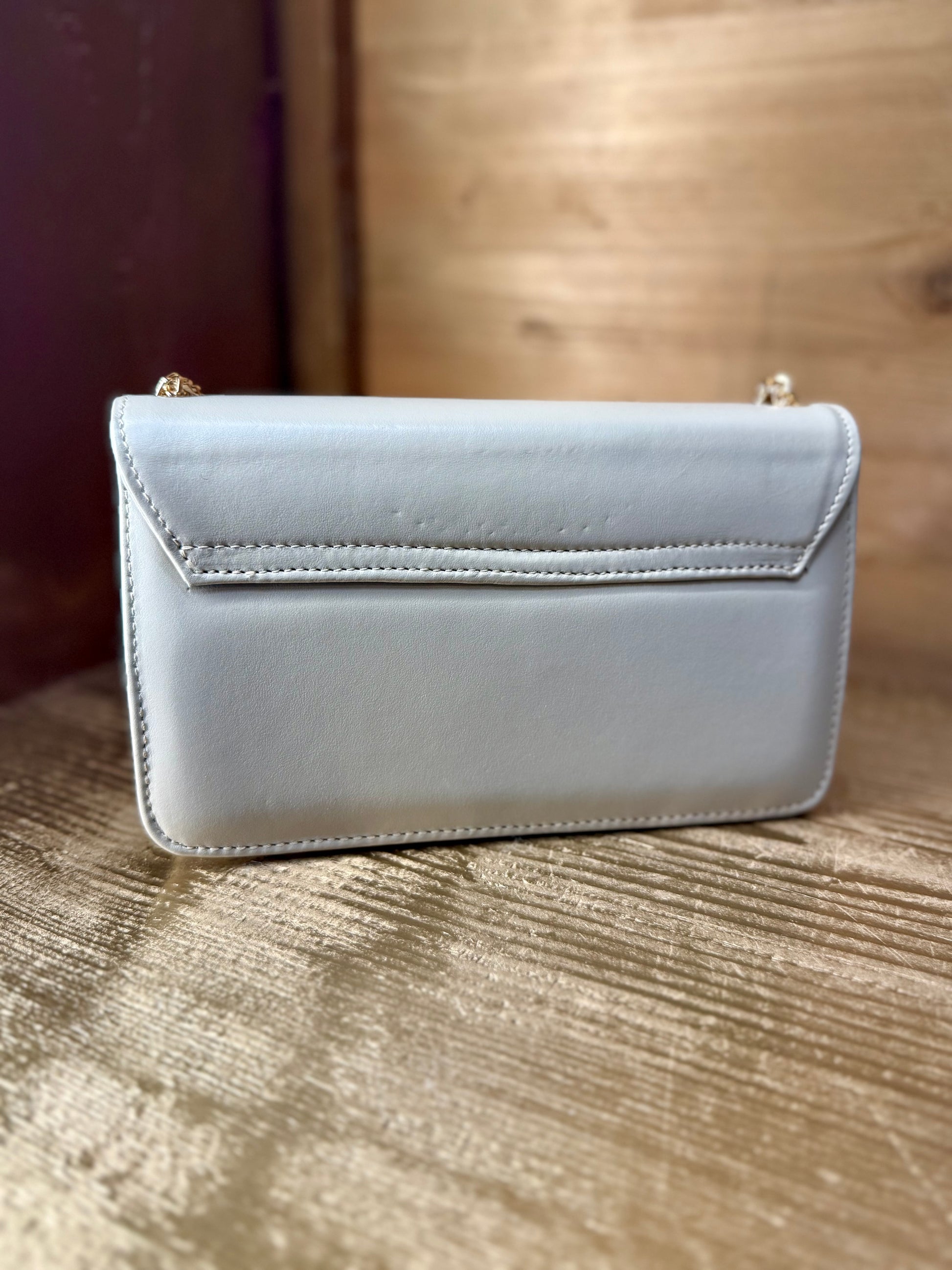 Design e artigianato: Borse artigianali in vera pelle pieno fiore con inserti in cristalli Swarovski.